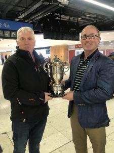 Picture of 2 men holding HolmPatrick Cup