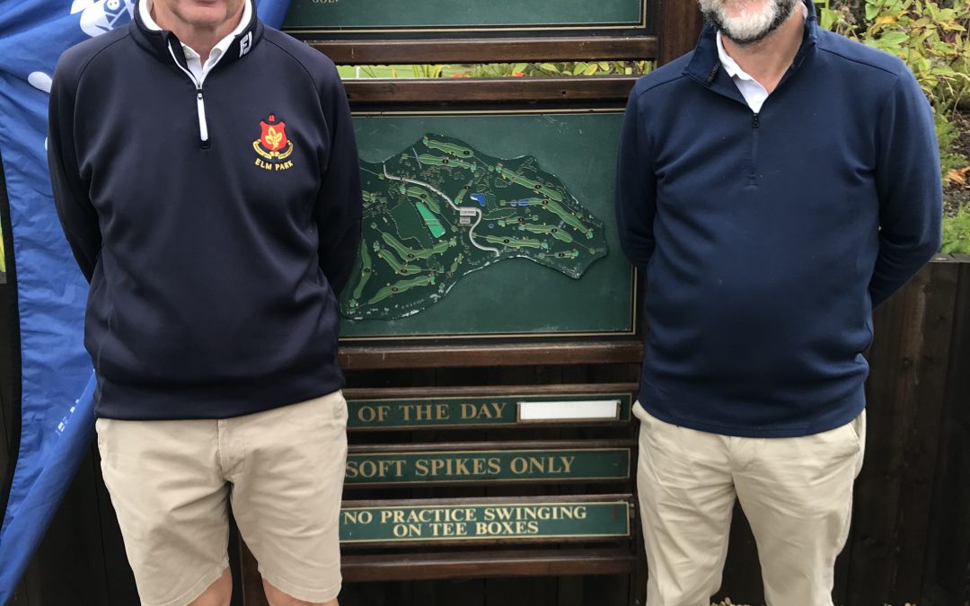 2 men wearing navy golf tops