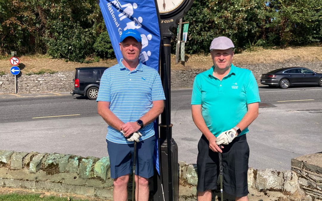 2 male golfers in blue topss